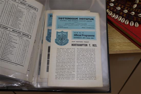 A large collection of Tottenham Hotspur memorabilia including programmes, official season handbooks, ticket stubs and a rattle,